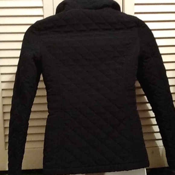 A navy blue puffer - Picture 2 of 2